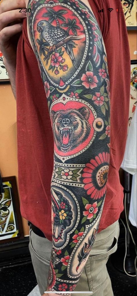 American Traditional Geometric Tattoo, Traditional Tattoos Inner Arm, Framed Sleeve Tattoo, American Traditional Framed Sleeve, Framed Traditional Tattoo Sleeve, Traditional Blast Over Tattoo, Traditional Style Sleeve, American Traditional Frame Tattoo, American Traditional Tattoo Sleeve Men