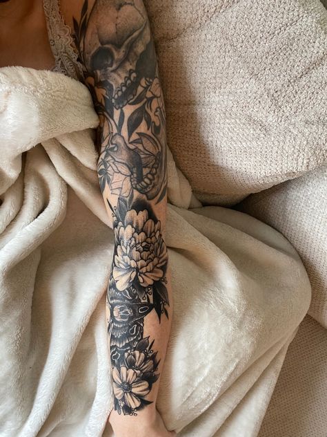 Dark Themed Sleeve Tattoos, Floral And Skull Tattoo Sleeve, Skull With Floral Tattoo, Feminine Gothic Tattoo Sleeves, Skeleton Arm Sleeve Tattoo, Bones And Floral Tattoo, Skull Floral Tattoo Sleeve, Moths Tattoo Sleeve, Moth And Flower Tattoo Sleeve