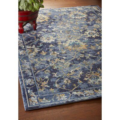 Step up your style game with this stunning area rug. Power-loomed in Turkey using 100% polypropylene, this piece offers both durability and comfort. The classic design features rich, bold color hues, creating a statement in any room. The cotton backing provides added comfort while the luxurious look is perfect for those who appreciate the finer things. Elevate your decor with this must-have area rug. Rug Size: Rectangle 4' x 6' | Blue / Brown 48 x 0.4 in Area Rug - Fleur De Lis Living Madrid Flo Blue Gray Gold, Persian Blue, Living Rugs, Decorative Borders, Navy Area Rug, Floral Area Rugs, Filigree Design, Persian Area Rugs, Blue Area