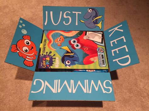 "Just Keep Swimming" Care Package for military or college - Finding Dory Care Package - Finding Nemo Care Package - medium flat rate box - filled with @Target $1 section items and snacks! Sent to Adopt a US Soldier/Project Front Lines.  Made by @Kristin Gayle Soldier Care Packages, Friends Leaving, Deployment Packages, Missionary Care Packages, Deployment Care Packages, Military Care Package, Just Keep Swimming, College Care Package, Bf Gifts