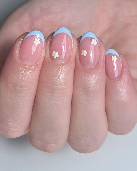 Introducing our 2024 Spring Collection. Discover a range of gel polishes in delicate pastels, each inspired by spring's blossoming flowers. These colors are designed to resonate with your sense of style and grace, bringing the essence of spring right to your fingertips. 
[Credit: elbebeauty on Instagram]
french nails, spring nails, simple nail designs, short nails, floral nails, blue nails, oval nails Portugal Inspired Nails, Short Floral Nails, Simple Summer Nail Ideas, Oval Nails Designs, Gel Nails French, Simple Spring Nails, Summer Nail Ideas, Short Gel Nails, Cute Simple Nails