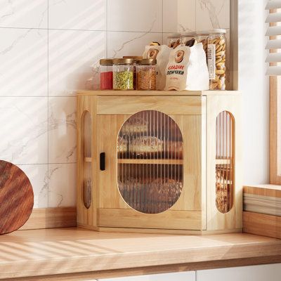 This white, double-layer wooden bread box with an acrylic window offers a stylish and spacious storage solution for bread loaves, ideal for kitchen countertops, corner spaces, or farmhouse pantry shelves. Hokku Designs Color: Original | Hokku Designs Bread Box for Kitchen Countertop in Original | Wayfair | Organization Pantry Planning, Pantry Plans, Wooden Bread Box, Vintage Bread Boxes, Bread Loaves, Farmhouse Pantry, Pantry Shelves, Corner Space, Bread Boxes