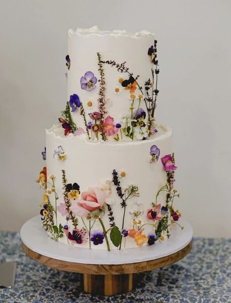 Meadow Wedding Cake, Wedding Cakes With Wild Flowers, Wildflower Bridal Shower Cake, Wild Flower Theme Wedding, Wild Flowers Wedding Cake, Wildflower Wedding Theme Cake, Wild Flower Engagement Party, Whimsical Garden Wedding Cake, Wedding Cakes With Real Flowers