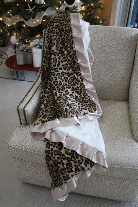 "Wrap yourself in this cozy leopard animal print minky blanket in sand and black with a plush embossed damask minky back and champagne gold satin trim. This is a great addition to your home decor for your living room or bedroom. Makes a great housewarming, Mother's Day or Corporate/Business Gift. Machine wash warm, tumble dry low, do not iron. Measures 76\" x 65\" Pre-washed Your blanket will come with a BGD Ribbon Slide and Satin Ribbon and wrapped in tissue paper and sealed with a BGD sticker. Chetta Print Blanket, Cheetah Print Room Ideas, Leopard Bedroom Decor, Cheetah Bedroom, Leopard Blanket, Blanket Couch, Couch Throw Blanket, Satin Bedding, Couch Throw