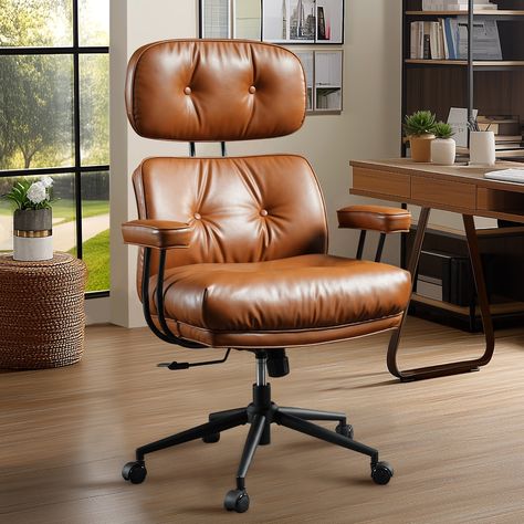 Support your spine with this modern office chair from OVIOS. The ergonomic seat swivels 360 degrees, reclines, and adjusts to fit your desk height. Linear tufting accents each of the three PU upholstery colors. Office Chair Brown Leather, Brown Leather Chair Office, Mid Century Modern Leather Chair, Brown Leather Office Chair, Office Work Station, Men’s Office, Modern Leather Chair, Office Revamp, Ergonomic Home Office