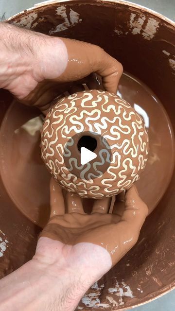 Adam Johnson on Instagram: "Theres magic in pottery and doing a satisfying dip always reminds me of chocolate 🍫 So I thought I’d go glazey crazy in celebration of Easter with some of my favourite dips on these egg like pinch pots.   Made by painting @potclays wax emulsion over the surface of the pot before dipping them in a bucket of Blue glaze. Blue!! 🩵💙 I’ve not gone colour blind, this glaze turns from deep chocolate brown to ocean blue after firing and the wax burns away leaving a bare clay body 🍫🤎🩵💙  Do you see satisfying magic or wiggley worms?   #satisfying #satisfy #eastersunday #chocolatetart #gbbo #potterythrowdown #potterystudio #ceramicsofinsta #clayart #glaze #potter #pottery" Colour Blind, Adam Johnson, Favorite Dips, Color Blind, Pinch Pots, Chocolate Tart, Pottery Studio, Ocean Blue, Clay Art