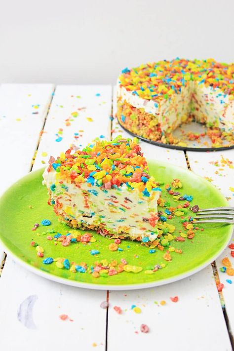 Looking for a unique twist on a classic cheesecake recipe? Wait until you try this one. This is a Fruity Pebbles Cheesecake. #MyHeavenlyRecipes #Cheesecake #dessert Fruity Pebbles Cheesecake, Fruity Pebble Cheesecake, Fruit Cheesecake, Fruity Pebbles Cereal, Pebbles Cereal, Heavenly Recipes, Cheesecake Recipes Classic, Fruity Treats, Classic Cheesecake