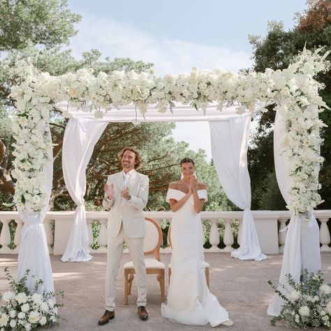 A timeless union under the white chuppah, with the sea as witness.... In the stunning venue Castel Bay, endless horizon provide the perfect backdrop for a love story written in the stars. This pure white chuppah stands as a symbol of peace, tradition and the beginning of your new story. Could you imagine saying “I do” with this view? Drop a ❤ if you're dreaming of a seaside wedding! Planning & design @Agencelb Venue @castel_bay Photo @marjorie.manfre Video @juliens.realstory Floral desi... Simple Chuppah, Wedding Chuppah Flowers, White Chuppah, Chuppah Flowers, Wedding Chuppah, Bay Photo, Symbol Of Peace, Written In The Stars, Seaside Wedding