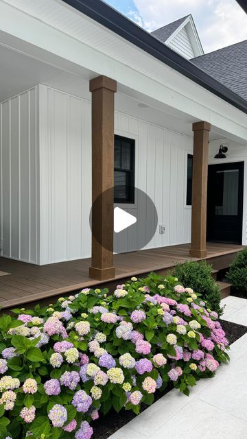 Erica Soutar on Instagram: "Fiberglass porch columns are the way to go! They are maintenance free and you don’t have to worry about discoloration or moisture or mold! Here is exactly what we used to achieve this looks:  Sherwin Williams Exterior Stain in color - WoodBriar  We used this as our base coat and covered the entire column with this color.  Sherwin Williams Exterior Stain in Color - Lodgebrown  This was the color we used for dimension. We used four parts water to one part paint and created a watered down top coat which when applied correctly it will sit in the grooves of the columns and provide dimensions.   If you have these columns my biggest piece  of advice is to have a sample piece and play around with different colors and techniques. I personally didn’t like the one solid st White House With Wood Columns, Outdoor Pillar Design, White House Stained Porch Posts, White House With Stained Columns, White House Brown Columns, White House Wood Columns Front Porches, Stained Porch Columns, Diy Porch Columns Wraps, Front Porch Columns Makeover