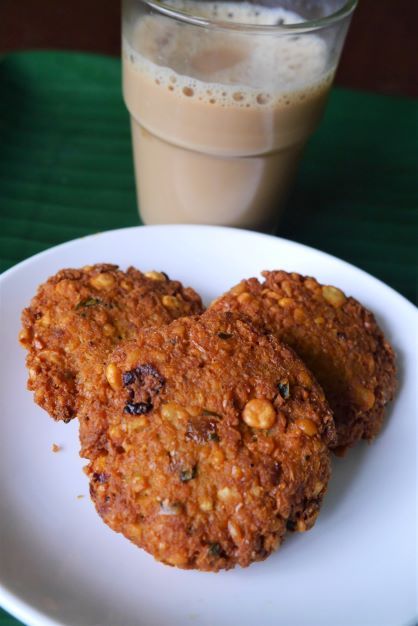 Parippu Vada/ Daal Fritters ( South Indian tea-time Snack) - Tastehive Parippu Vada, South Indian Snacks, Indian Tea, Spicy Snacks, Tea Time Snacks, South Indian Food, Indian Snacks, Food Pin, How To Make Tea