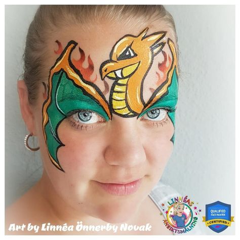 Pokémon "Charizard" Face Paint Video by Linnéa Önnerby Novak Pokémon Face Painting, Charmander Face Paint, Charizard Makeup, Charizard Face Paint, Pokemon Face Painting, Pokemon Facepaint, Pokemon Face Paint, Dragon Face Painting, Pokémon Charizard