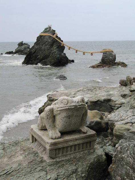 Meoto Iwa This pair of small sea rocks has been "wed" using rope and ancient Shinto tradition Japan Sea, Stone Beach, Sea Rocks, Ancient Japan, Stone Statue, Japanese Folklore, Ghost Of Tsushima, Japan Aesthetic, Aesthetic Japan