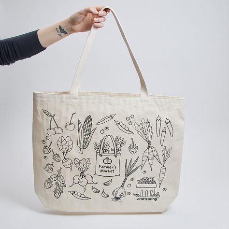 We made a bag with our friends at Winter Water Factory! Cut, Sewn and Printed down the street from us in Winter Water Factory's local Brooklyn studio, this fun oversized tote features illustrations of our new fruit and veggie ornaments. Check out more from Winter Water Factory here. Made locally in Brooklyn with up-cycled cotton canvas. Features black line illustrations of our Farmer's Tote Bag Ornament, Pick Your Own Blueberry Basket, Strawberries, Cherries, Beaded Peapod, Carrot, Radish, Garli Basket Strawberries, Blueberry Basket, Garlic Corn, Farmers Market Tote Bag, Water Factory, Line Illustrations, Vegetable Bag, Fruit And Veggie, Clothes Board