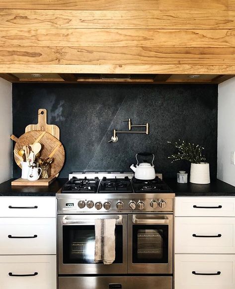 One day I will have a tap over an stove. Love everything about this picture. Cooking Alcove, Slate Backsplash, Mountain Kitchen, Hood Vent, Metallic Backsplash, Dark Kitchen, Countertop Design, Black Board, Up House