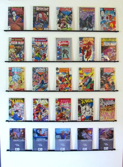 DIY comic book wall display. Just used the wall mount for wire closet organization from Lowes. Painted it black and used screws to secure it into the wall! <3 this! Book Wall Display, Comic Book Storage Ideas, Comic Book Wall Display, Comic Book Bedroom, Storage Ideas Closet, Diy Comic Book, Comic Book Rooms, Comic Book Crafts, Book Storage Ideas