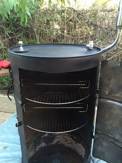 behold the jd smoker a huge bbq smoker out of 2 barrels Como Plantar Pitaya, Wine Barrel Coffee Table, Custom Bbq Smokers, Barrel Bbq, Diy Smoker, Barrels Diy, Barrel Smoker, Homemade Smoker, Wine Barrel Table