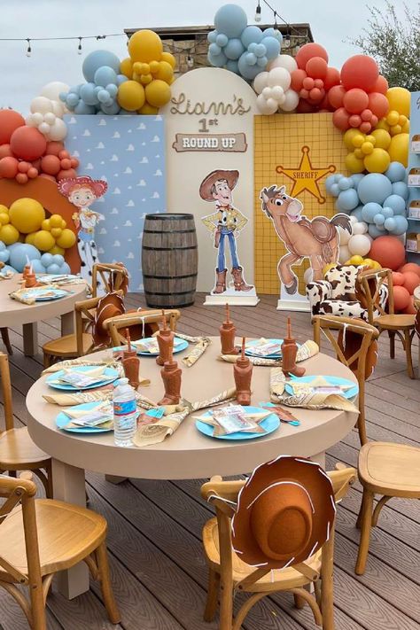 Check out this fun Toy Story-themed birthday party! The table settings are fab! See more party ideas and share yours at CatchMyParty.com Toy Story Place Setting, Woody Cowboy Party, Toy Story Cowboy Party, First Rodeo Birthday Boy Toy Story, Toy Story Table Decor, You Story Birthday, Muted Toy Story Party, First Round Up Birthday Toy Story, Toy Story Birthday Table