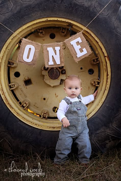 1st Birthday Rodeo Photoshoot, Farm First Birthday Photo Shoot, 1st Birthday Boy Tractor Theme, 1st Birthday Tractor Pictures, Red Tractor First Birthday Party, 1st Birthday Farm Pictures Photo Ideas, Tractor Cake Smash, Farm 1st Birthday Photoshoot, Tractor One Year Birthday