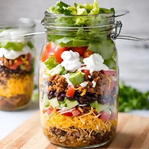 Taco Salad in a Jar Taco Salad In A Jar Recipes, Mason Jar Salads High Protein, Pasta Salad In A Jar Recipes, Salad In A Jar For A Week, Taco Salad Jar, Jar Taco Salad, Mason Jar Taco Salad, Salads In Mason Jars, Mason Jar Lunches