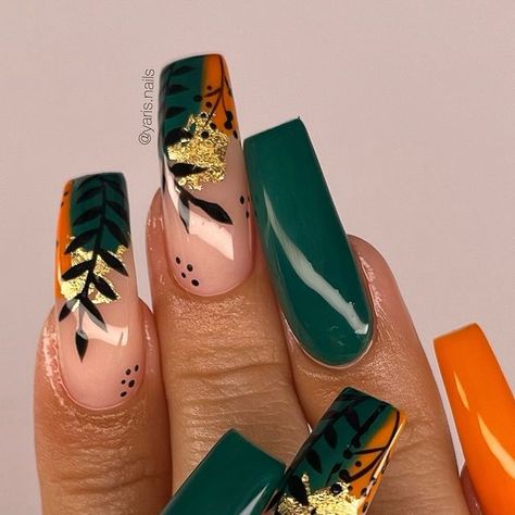 Yari’s Nails LLC on Instagram: "A pop of color 🧡🌿 Using @elegancenailsupply “Je T’aime” cover acrylic and size 14 acrylic brush — Code “YARI” to save Recreation of another nail tech’s work, tag them if you know them long nails, coffin nails, long coffin nails, natural nails, overlay nails, acrylic overlay, manicure, gel nails, acrylic application, green nails, orange nails, emerald nails, fall nails, gold nails, leaf nails, hand painted nail art, abstract nail art, floral nail art, nail art, nail inspo, trendy nails" Orange And Green Nails Design, Fall Colors Acrylic Nails, Burnt Orange And Green Nails, Green Orange Nail Art, Orange And Green Nails Acrylic, Fancy Fall Nail Designs, Tropical Fall Nails, Nature Nails Acrylic, Orange And Green Fall Nails