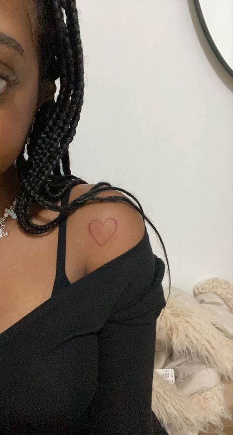 red heart tattoo on shoulder Red Ink Tattoos Small On Dark Skin, Heart On Shoulder Tattoo, Red Tattoo Dark Skin, Red Ink On Dark Skin, Red Ink Tattoos On Dark Skin, Heart Shoulder Tattoo, Red Tattoo On Dark Skin, Dark Heart Tattoo, Tattoo Red Ink