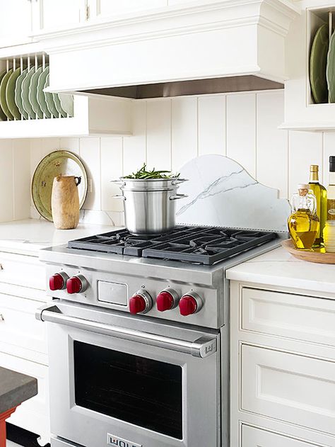 Layering a shapely piece of marble over tongue-and-groove siding creates a layered look for this backsplash: http://www.bhg.com/kitchen/backsplash/kitchen-backsplash-ideas/?socsrc=bhgpin111614pastperfected&page=6 Kitchen Beadboard, Backsplash Herringbone, Stove Backsplash, Unique Kitchen Backsplash, White Kitchen Backsplash, Beadboard Backsplash, Herringbone Backsplash, Brick Backsplash, Kitchen Backsplash Designs