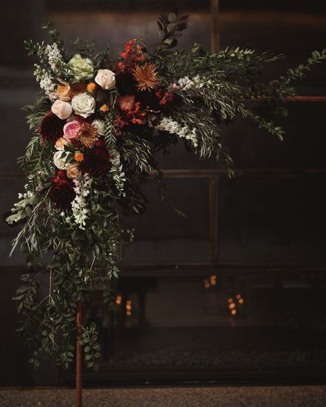 Erin Meadows on Instagram: “These stunning flowers from a wedding last year are both moody and romantic. Shoutout to @westvirjeni for doing such an incredible job.” Moody Terracotta Wedding, Moody Wedding Flower Arch, Moody Romance Wedding Centerpieces, Moody Floral Centerpiece, Moody Wedding Arbor, Dark And Moody Reception, Moody Floral Wedding Arch, Dark Modern Wedding Decor, Moody Romantic Wedding Florals