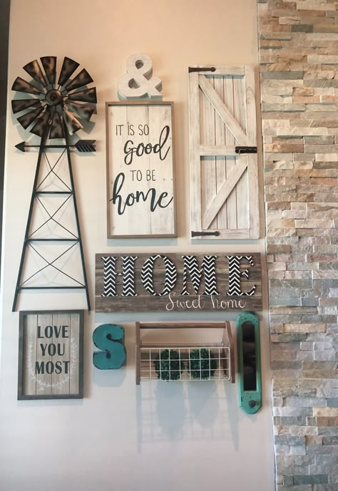 Farmhouse style gallery wall, windmill and barn door wall decor Windmill Wall Decor Ideas, Windmill Wall Decor Farmhouse, Barn Decorating Ideas, Windmill Decor Farmhouse, Barn Door Wall Decor, Barn Door Wall, Rustic Gallery Wall, Barn Door Decor, Cow Wall Decor