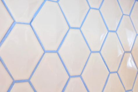 Boring No More: 18 Ways Colorful Grout Spices Up Dull Tile: Tip: Colorful Grout… Colorful Grout, Blue Grout, Backsplash Blue, White Mosaic Tile, Hexagon Tile Floor, Coloured Grout, Hex Tile, Easy Home Improvement, Penny Tile