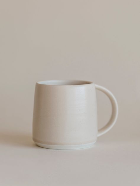 This mug is ideal for daily use. You can enjoy your coffee in your office or at home as you like. Besides, it is also a great gift for those who love the simple life, especially porcelain lovers. A favorite in beige with lustrous color and smooth, creamy sheen. Dimensions: 4.1" W x 3.1" D x 3.1" H / 8.8 oz White Porcelain Mugs, White Ceramic Mug, Coffee Luxury, Modern Nest, Sand Vase, Coffee Collection, Wood Cheese Board, The Simple Life, Agate Coasters