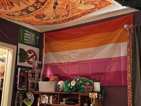 Lesbian Dorm Room Ideas, Flag Bedroom Ideas, Pride Flag In Room Aesthetic, Lesbian Flag Room, Pride Flag Room Decor, Pride Flags In Bedrooms, Pride Flag In Room, Room With Lesbian Flag, Mansion Rooms