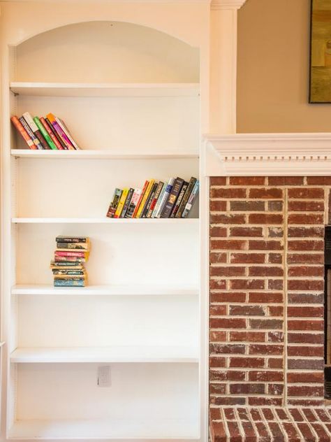 Learn how to give a builder-grade bookcase a high-end look with trendy wallpaper, then get tips for styling the shelves with chic accessories, clutter-concealing baskets, framed photos and books. Wallpaper In Bookshelves, Prefab Cabinets, Wallpaper Bookcase, Painting Bookcase, Wallpaper Paper, Fireplace Bookshelves, Wallpaper Project, With Wallpaper, Interior Design Boards