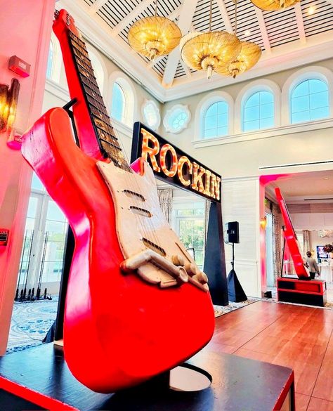 Striking chords and neon lights! 🎸✨ Dive into the rock and roll rhythm with our electrifying setup. #redguitar #rocknroll #rocknrolltheme #rockandrolltheme #rockandroll #rockin #rockandrollevent #lightupsign #eventdecor #rocktheme #musictheme #musicevent #florida Red Guitar, Rock Of Ages, Light Up Signs, 80s Party, Event Themes, Music Event, Neon Lights, Summer Camp, Corporate Events