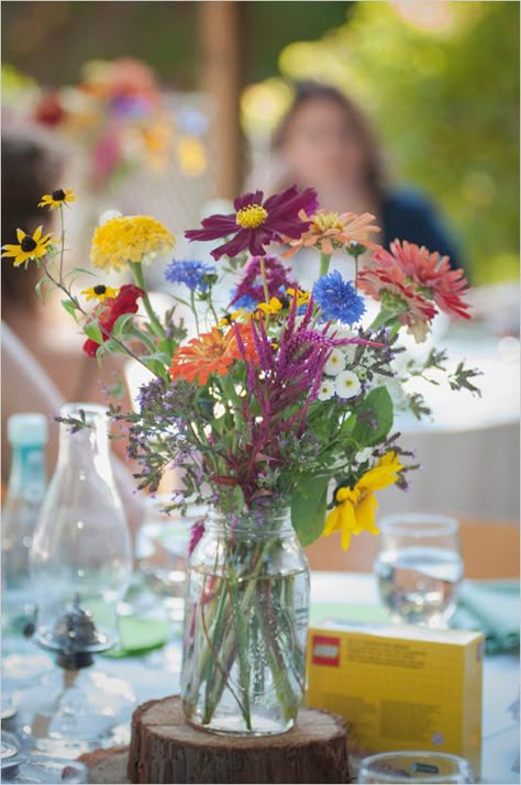 colorful wildflower centerpiece #weddingreception #wildflowers #weddingchicks http://www.weddingchicks.com/2014/02/26/fun-and-feisty-forest-wedding/ Wildflower Centerpieces, Wedding Centerpieces Mason Jars, Rustic Boho Wedding, Unique Wedding Flowers, Mason Jar Wedding, Wildflower Bouquet, Flower Centerpieces Wedding, Wedding Chicks, Wildflower Wedding