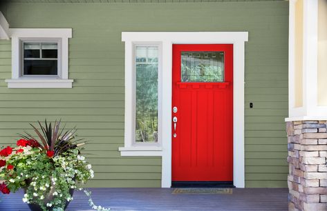 bold red front door and sage green house Sage Green House, Coral Door, Exterior House Doors, Orange Front Doors, Best Front Door Colors, Best Front Doors, Green Front Doors, Red Front Door, Door Colors