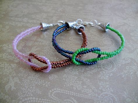 Beaded Infinity Knot Bracelet Project - Rings and ThingsRings and Things Infinity Knot Bracelet, Seed Bead Bracelets Diy, Bracelets Tutorial, Stone Bead Jewelry, Diy Bracelets Tutorials, Bead Tutorials, Infinity Knot, Diy Wrap, Bead Projects