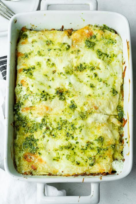 Your family will love the creamy comforting flavors of this chicken pesto lasagna! Serve with a side of garlic bread and dinner is served! #lasagnarecipe #pestolasagna #chickenlasagna Pesto Lasagna Recipe, Chicken Pesto Lasagna, Cheesy Chicken Tortilla Soup, Honey Lime Enchiladas, Strawberry Feta Spinach Salad, Easy Creamy Chicken, Pesto Lasagna, Oven Ready Lasagna, Lasagna Casserole