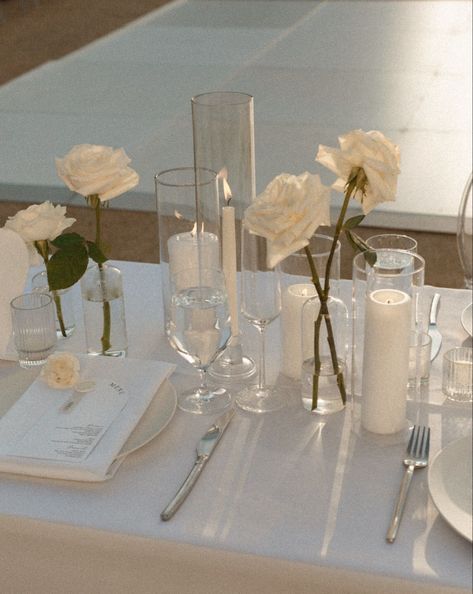 Minimalist Wedding Decor Indoor, Candelabra Decorating Ideas, White Rose Table Setting, Candle Tablescapes Wedding Round, Wedding Bud Vases And Candles, Single Stem Wedding Centerpieces, Wedding Decor No Flowers, Minimal Flower Wedding Decor, Minimal Table Setting Wedding