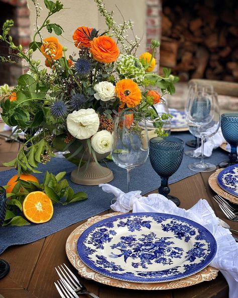 Orange Blue And White Wedding, Green And Orange Tablescape, Blue Green And Orange Wedding, Tangerine And Blue Wedding, Primary Colors Wedding, Orange And Blue Table Setting, Orange Blue Cream Flower Arrangement, Blue And Orange Tablescape, Citrus And Flowers