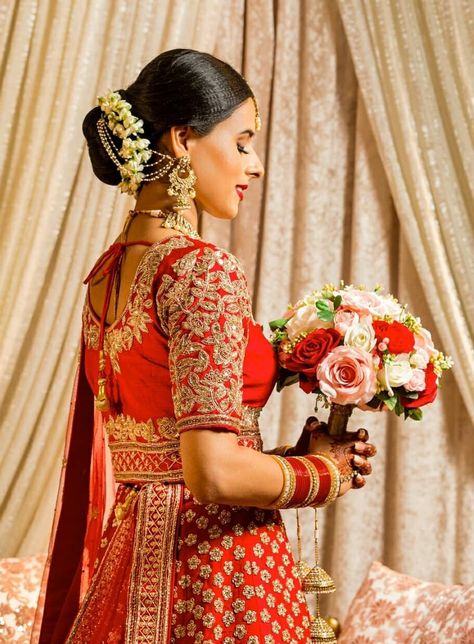 Amazingly shot by @glimmerfilms Throwback Thursday to Virpal looking gorgeous in red with our bouquet 🌹Red will always be a classic! Hair & Makeup - @26rl Wedding Outfits - @seo_bridal_studio9 @indochino Decor - @abbywedding Florist - @didisflowers Mehndi - @sonikashennaart Cakes - @sweetavenuebakery DJ - @exclusiveentcanada @harmony.entertainment Jewellery - @parasfashions ​ Red Sari, Classic Hair, Red Bouquet, Floral Designer, Throwback Thursday, Elegant Floral, Wedding Outfits, Indian Bride, Floral Designs