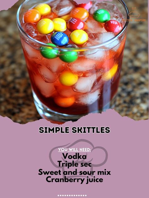 Taste the rainbow in a glass! This fun and fruity cocktail will brighten up any party. 🍹✨ #ColorfulCocktails #FruityFun Simple Skittles Ingredients: Vodka (1 oz) Triple sec (1 oz) Sweet and sour mix (1 oz) Cranberry juice (1 oz) Sprite (1 splash) Skittles candy (for garnish) Ice cubes (as needed) Instructions: Mix vodka, triple sec, sweet and sour mix, and cranberry juice in a shaker with ice. Shake and strain into a glass. Top with a splash of Sprite and garnish with Skittles. 🌈🍭 This Si... Skittles Cocktail, Classy Drinks, Skittles Candy, Bartender Drinks Recipes, Fruity Cocktail, Bartender Drinks, Pretty Alcoholic Drinks, Yummy Alcoholic Drinks, Tipsy Bartender