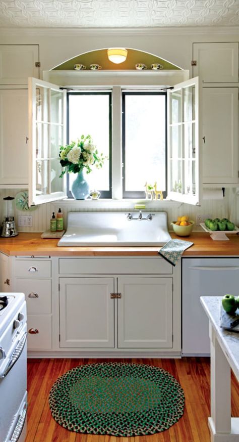 Simple ground rules and a bit of ingenuity help to create a sunny, 1940s inspired kitchen. Kitchen Restoration, Sink Window, 1940s Kitchen, Kitchen Sink Window, House Journal, Journal Magazine, Kitchen Corner, Modern Kitchen Cabinets, Tiny Kitchen