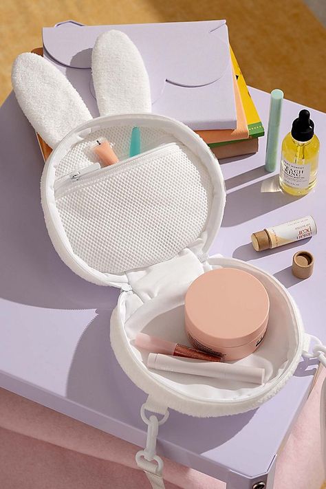 Carry your cosmetics wherever you go with the help of this Miffy makeup bag featuring our fave bunny’s head. Complete with a strap for easy carrying, use this cosmetic bag to transport your makeup and other daily essentials. Features Shaped makeup bag from Smoko Miffy silhouette we love Strap for easy carrying Zip closure Versatile - use it as a makeup bag or purse! Content + Care Polyester Spot clean Imported Size Dimensions: 8" l x 4" w x 10" h Weight: 2 lbs | Smoko Miffy Makeup Bag in White at Urban Outfitters Bunny Character, Cos Bags, Fake Makeup, Australia Clothes, Nintendo Switch Accessories, Makeup Game, Shopping Photography, Curtains For Sale, Game On