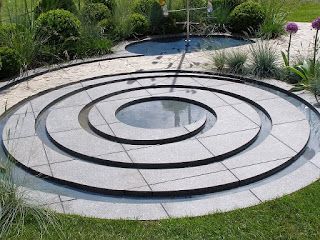 beautiful water feature spiral; 3 1/2 rotations; lines are narrow rills  ***  Serenity in the Garden: Water in the Garden - Magic abounds Therapeutic Garden, Square Fountain, Circular Garden, Backyard Stream, Kolam Air, Water Architecture, Taman Air, Outdoor Water Features, Garden Water Feature