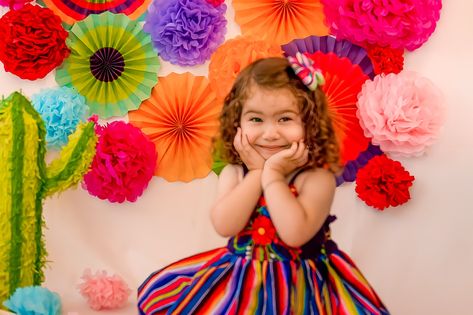 Fiesta Fiesta! This little sweetie celebrated her Three-esta in style with a colorful backdrop to match her vibrant personality. #learningthroughart #queensphotographer #longislandphotography #photographytipsandtricks #newbornphotographernyc #childrenphotographers #kidsofthelens #sweetsolphoto #creatingart #chasethelight #lifestylephotographers #familyportraitsession #familyphotoshoots #fujicamera #motherhoodphotography #specialneedsmoms Three Esta Photoshoot, Three Esta, Colorful Backdrop, Milestone Photography, Vibrant Personality, Fuji Camera, Newborn And Family Photography, Motherhood Photography, Queens Ny