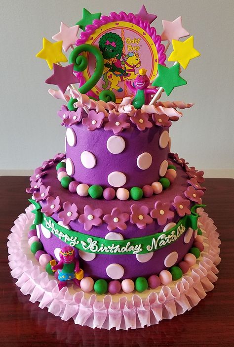 Barney Baby Bop Tiered Birthday Cake - Adrienne & Co. Bakery Barney Themed Birthday Party, Barney Birthday Cake, Barney Birthday Party, Barney Cake, Tiered Birthday Cake, Emoji Birthday Cake, Barney Birthday, Toddler Birthday Cakes, Girl Birthday Cake