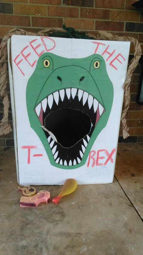 T-Rex game with dog toys Dinosaur Birthday Games, Fête Jurassic Park, Dinosaur Party Games, Dinosaur Activities Preschool, Jurassic Park Party, Dinosaur Birthday Theme, Dinosaur Themed Birthday Party, Dino Birthday Party, Anniversaire Harry Potter