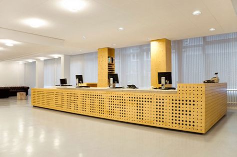 Library Interior Design in University of Amsterdam Library Interior Design, Info Desk, University Of Amsterdam, School Reception, Library Desk, Library Interior, Reception Desk Design, Library Furniture, Reception Counter