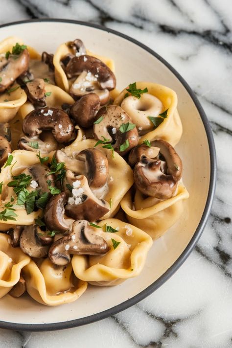 A photo of a  Mushroom Tortellini a Tortellini Recipes Mushroom Tortellini Recipes, Recipes With Tortellini, Cheese Tortellini Pasta, Spinach And Ricotta Tortellini, Ricotta Tortellini, Easy Tortellini Recipes, Mushroom Tortellini, Easy Tortellini, Tortellini Alfredo