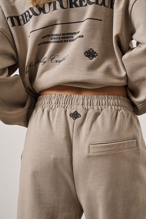 Colour: Beige Details: - Oversized fit cuffed joggers - Elasticated waistband - Elasticated cuffs - Inner waistband adjustable cords - Print to front - Side seam pockets - Pocket to back - Embroidery emblem below back waistband - Model wears size 6 and is 5”8 This has been designed as oversized, if you want a more regular fit we advise to size down. Fabric Composition: 100% Cotton Emblem Embroidery, Cuffed Joggers, Colour Beige, Black Friday Shopping, Black Friday Sale, Kids Jacket, Short Tops, Dress Collection, Coats Jackets